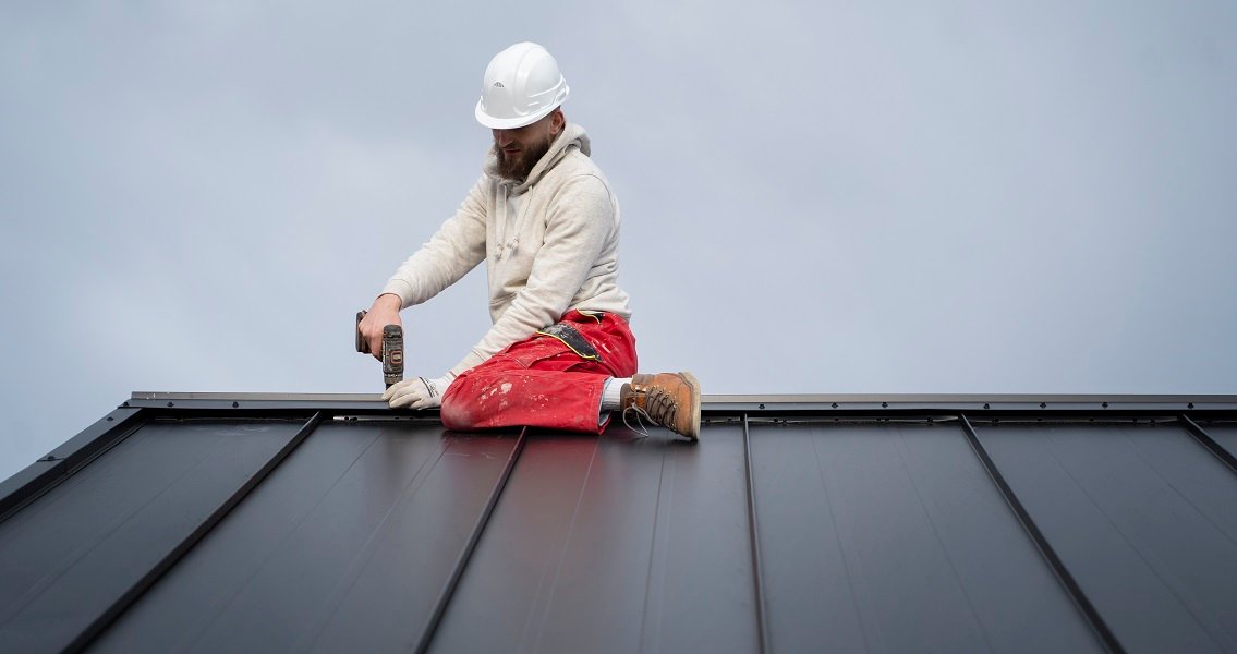 Rain gutters on metal roofs